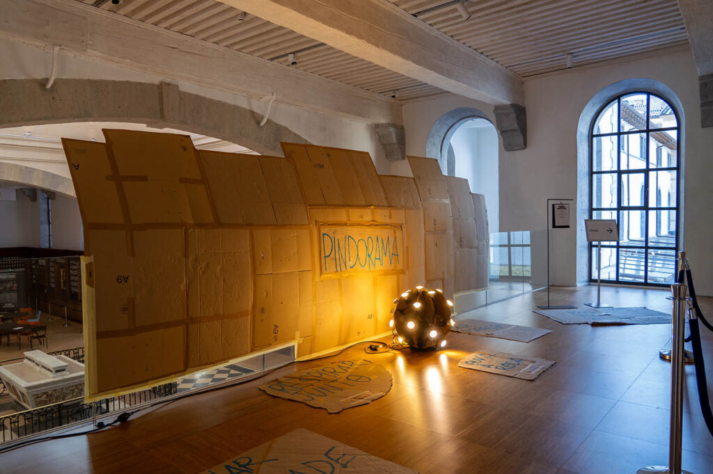 The cardboard constructions at the end of MARGIN by Original Bomber Crew. © Elyes Esserhane