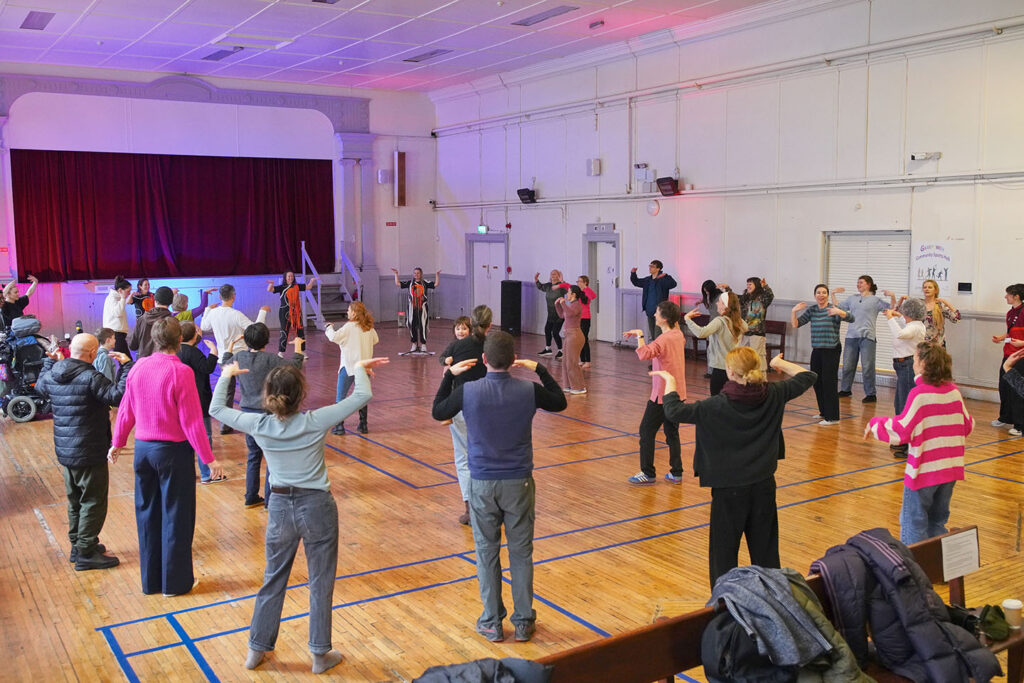 Handshakes to warm us up in Laura Murphy and Siobhán Ní Dhuinnín’s The Shake. © Maurice Gunning